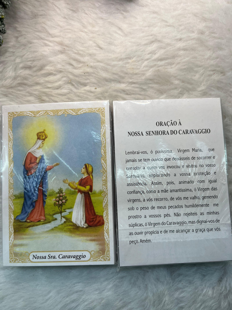 NOSSA SENHORA DO CARAVÁGIO - PACOTE C/ 100 SANTINHOS DE PAPEL