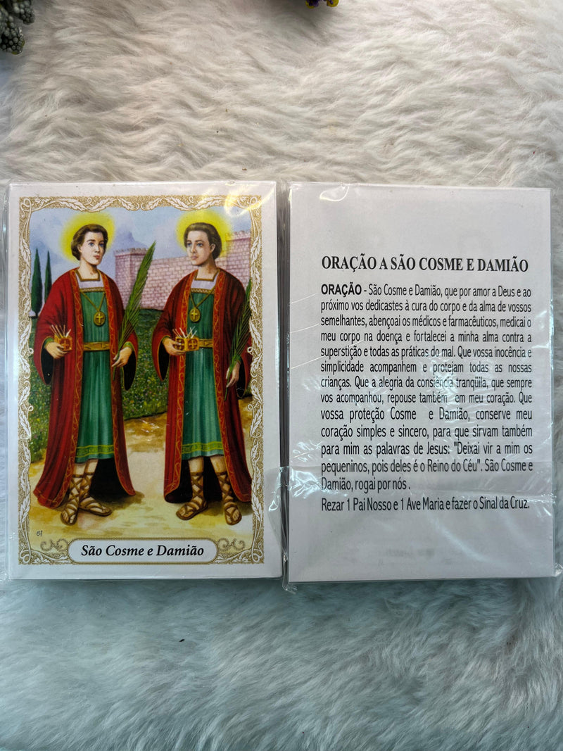 SÃO COSME E DAMIÃO - PACOTE C/ 100 SANTINHOS DE PAPEL
