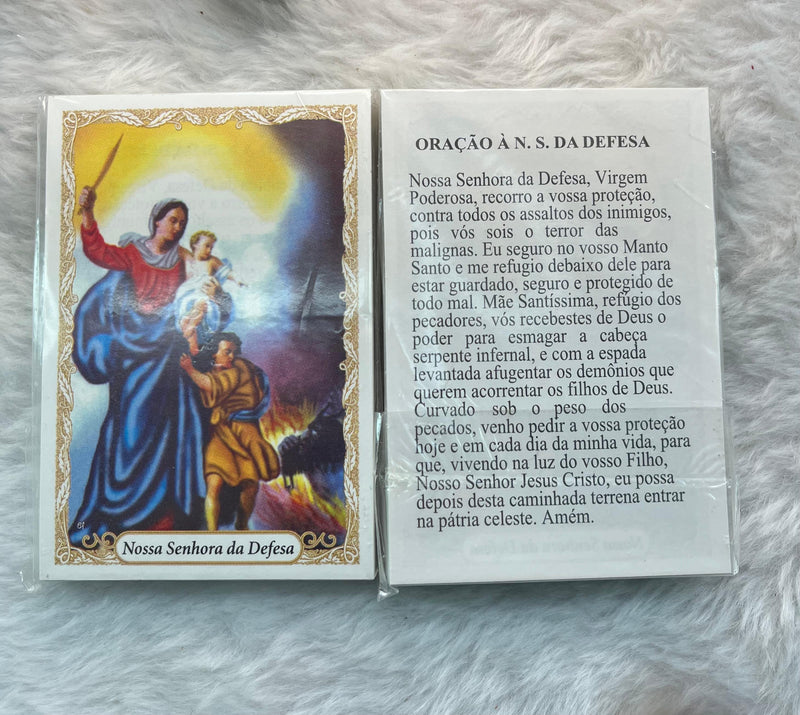 NOSSA SENHORA DA DEFESA - PACOTE COM 100 SANTINHOS DE PAPEL