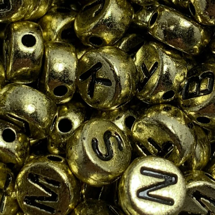 Letras Redonda 07mm DOURADO em plástico (PACOTE COM 50GR)