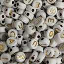 LETRA VOGAL REDONDO 07MM BCA C/ LETRA DOURADA EM PLÁSTICO (PACOTE COM 50GR)