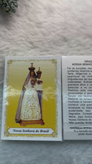NOSSA SENHORA DO BRASIL - PACOTE C/ 100 SANTINHO DE PAPEL